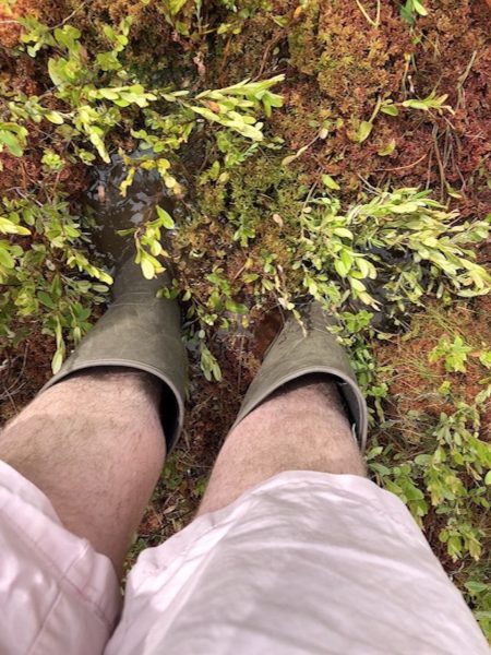 Dylan Fry ’19 ditched the flip flops and donned rubber boots on an interview assignment