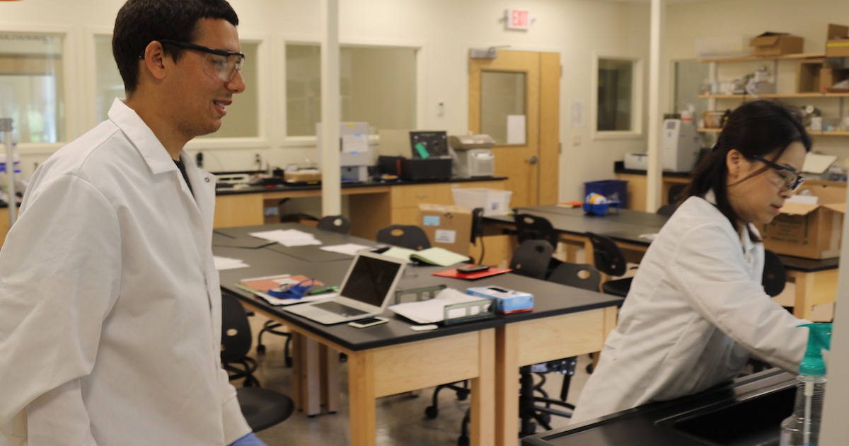 Student Avery Liotta Henderson works with Dr. Yi Jin Gorske in the Chemistry lab.