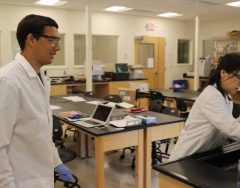 Student Avery Liotta Henderson works with Dr. Yi Jin Gorske in the Chemistry lab.