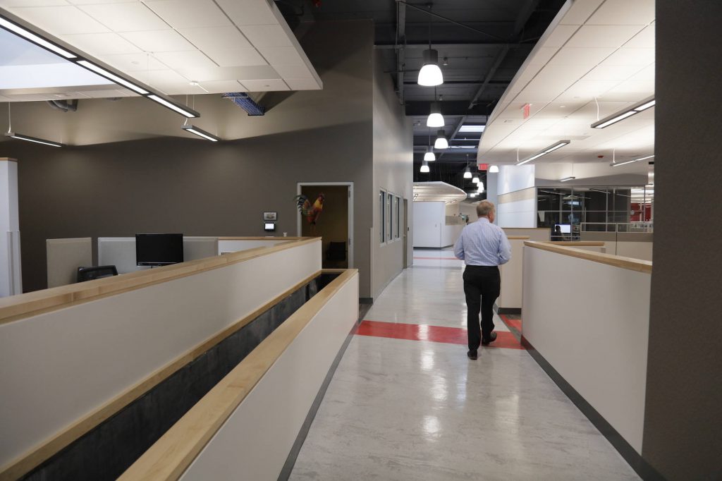 Peter Geiger walks through the 105,000 square foot Geiger headquarters in Lewiston, Maine. 
