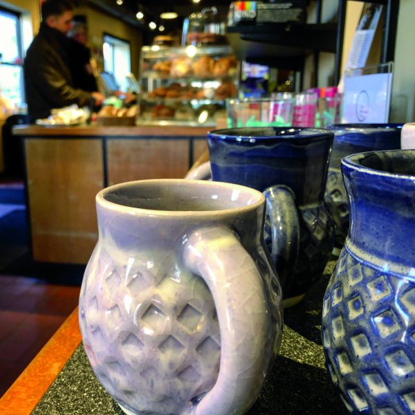 Customers at the Portland roastery Coffee by Design can purchase one of the ceramic mugs created by Moira DesRosiers ‘18.
