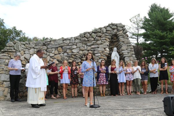 Lexi Frost ’20 reading at the Education Blessing Ceremony. 