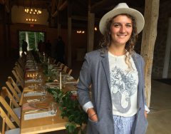 Elyse Caiazzo ’18 in the Stone Barn before a community dinner begins