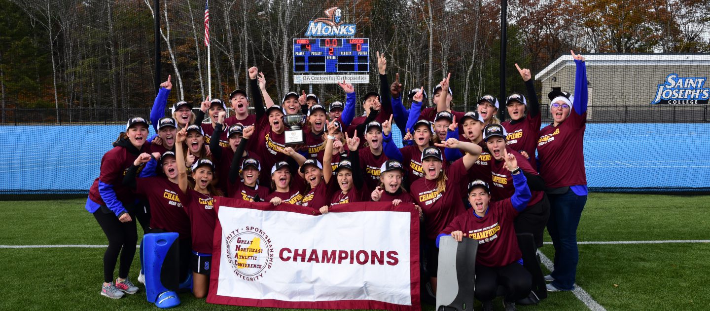 Field hockey team group photo after winning the GNAC Championships in 2018