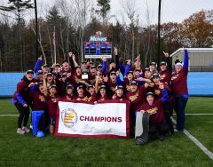 Field hockey team group photo after winning the GNAC Championships in 2018