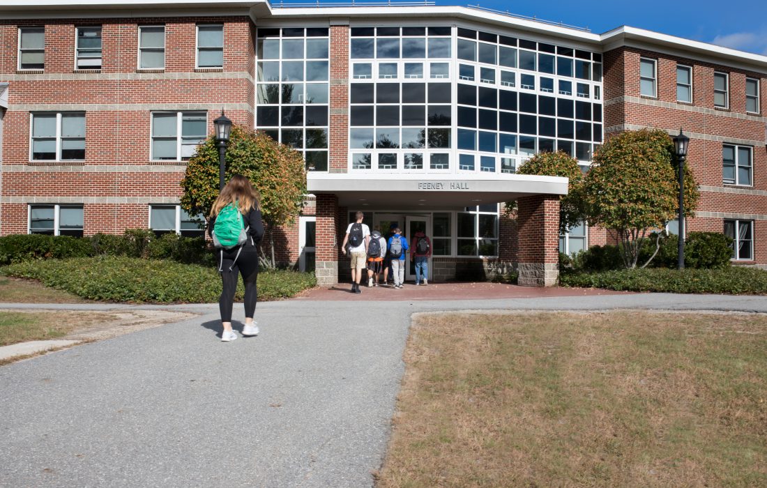 Students walking into Feeney Hall