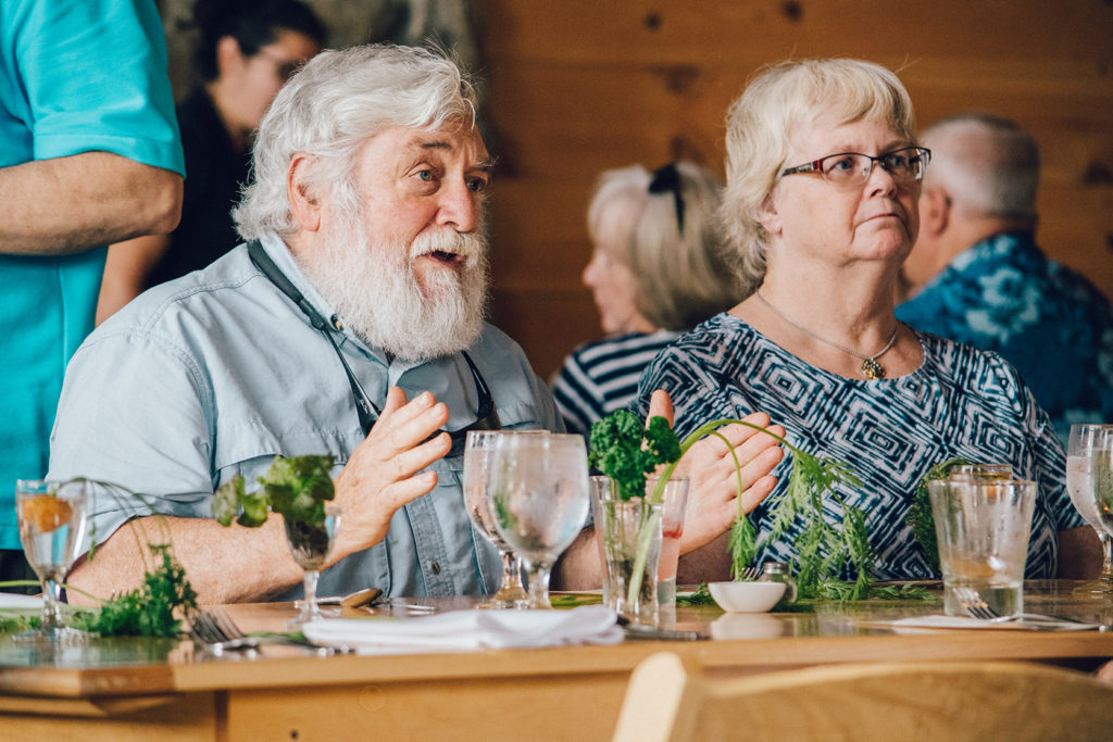 a couple at the community lunch at the Stone Barn at Saint Joseph's College of Maine- full size